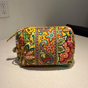 Vera Bradley Provencal yellow floral cosmetic bag vinyl lining.